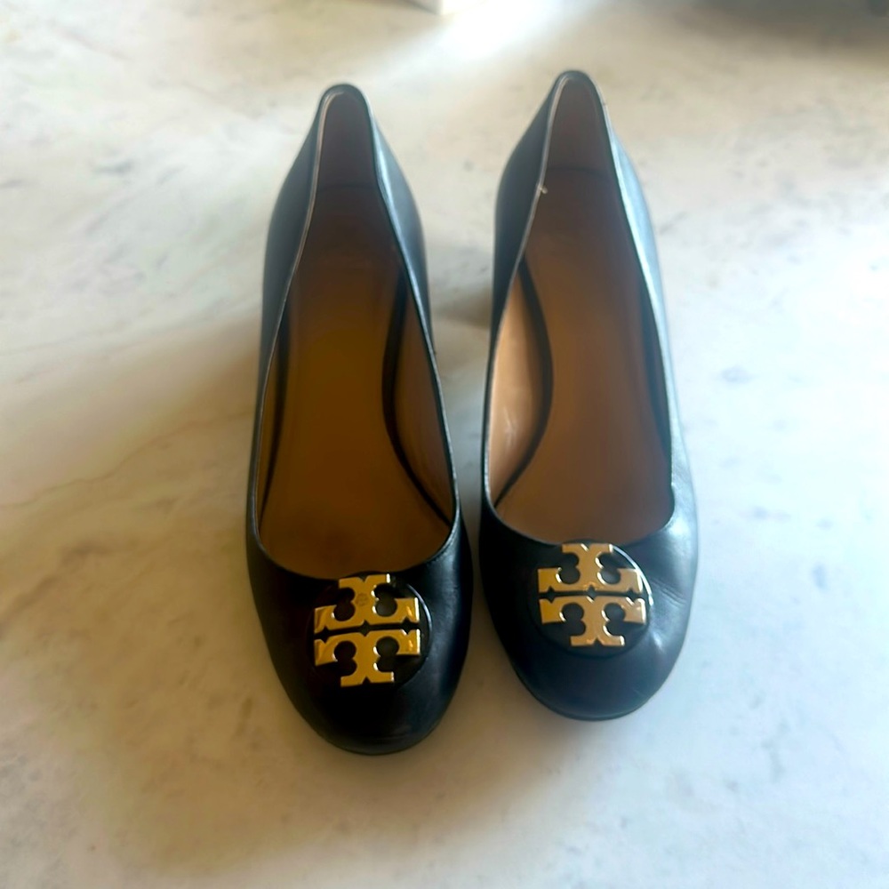 Black Tory Burch pumps with gold buckle, excellent condition